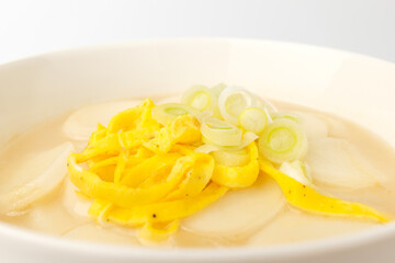 Rice cake soup on a white background