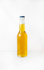 a transparent bottle of beer isolated on white background