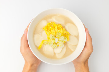 Rice cake soup on a white background