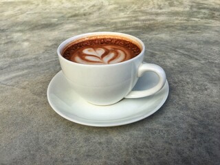 Hot cocoa in white cup. Hot chocolate in white cup.