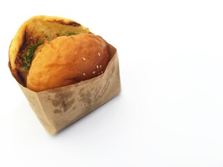 Hamburger chicken ready to eat in paper bag.
