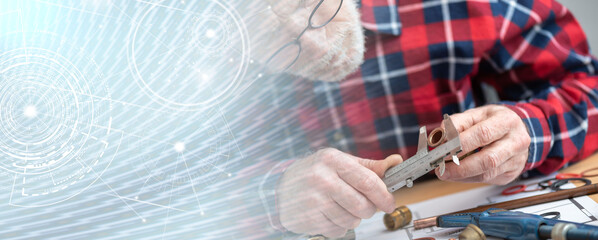 Plumber using a caliper; panoramic banner