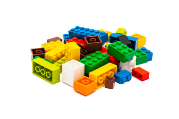 Multi-colored plastic building blocks. Toys and games.