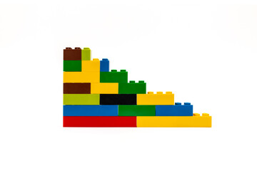 Multi-colored plastic building blocks. Toys and games.