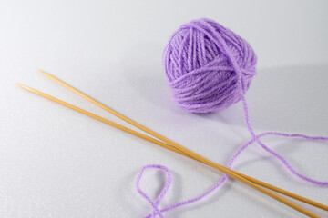 ball of yarn and needles