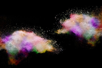 Explosion of colored powder on black background.