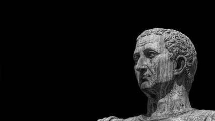 Caesar Augustus Nerva Emperor of Ancient Rome bronze statue along Imperial Fora road (Black and...