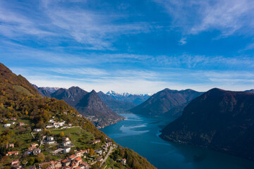 Obraz premium Aerial view of Lugano lake and the Monte Brè village in Canton Ticino