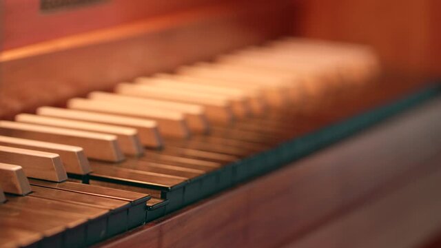 Church Organ keys  in an Evangelical Church. The black organ keys moving by itself during play.