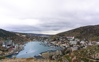 panorama of mountains and bay with ships