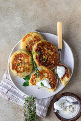 Delicious vegetable cutlets with potato and mushroom served with aromatic herbs and sauce. Healthy diet food concept. Vegan food.