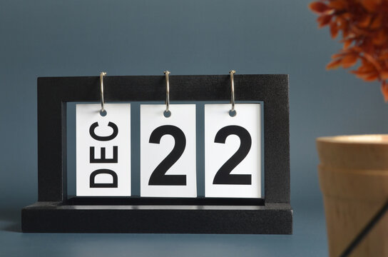 December 22, Date design with a black wooden calendar for a business, Date Plans to reminder.