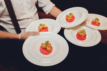Delicious panna cotta dessert with raspberries sauce.