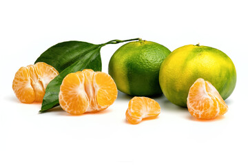 Ripe green and yellow tangerines and orange tangerine slices isolated on white background.
