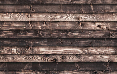 Seamless texture of dark brown old grungy wooden wall