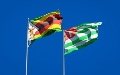 Beautiful national state flags of Zimbabwe and Abkhazia.