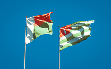 Beautiful national state flags of Madagascar and Abkhazia.