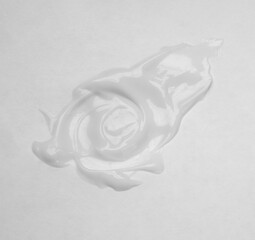 Cosmetic cream on grey background