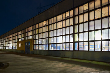 Night panorama of chemical plant building with dark blue sky. Compression buildings receding perspective with copyspace.