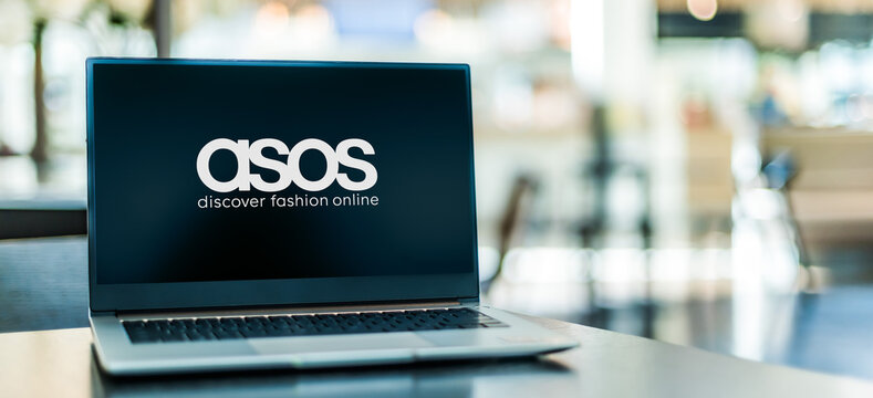 Laptop computer displaying logo of ASOS
