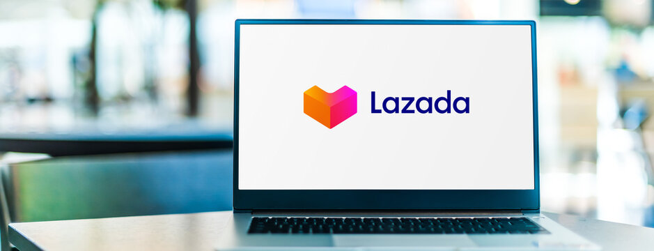 Laptop computer displaying logo of Lazada