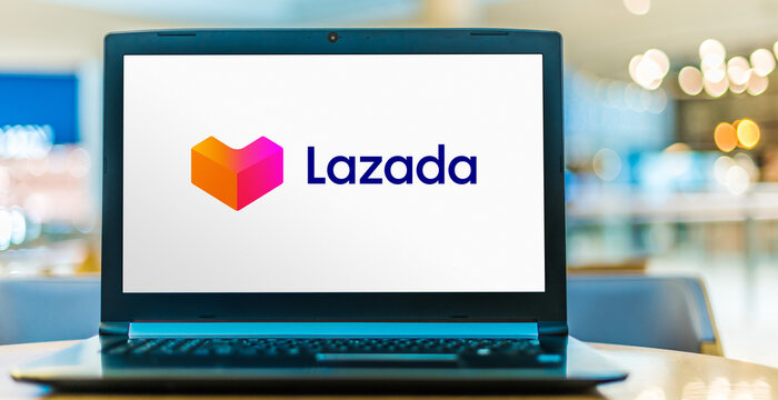 Laptop computer displaying logo of Lazada