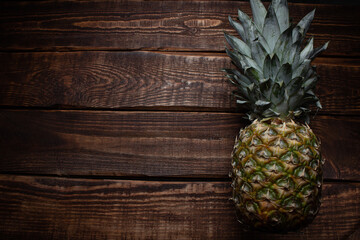 pineapple on wooden background