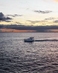 Sailing yacht in the ocean at sunset