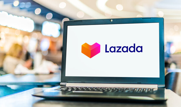 Laptop computer displaying logo of Lazada