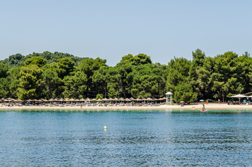 Fototapeta premium Evia island, Greece - June 28. 2020: Panorama of the tourist island of Skiathos in Greece 