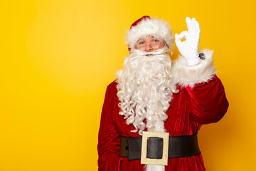 Santa Claus showing OK sign