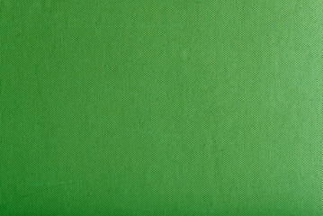 Fototapeta premium Texture of green cardboard or thick pressed cardboard as a background.