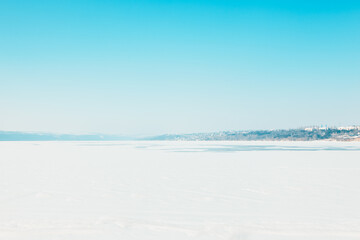 Winter landscape of frozen lake 