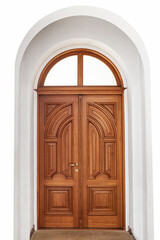 Beautiful large wooden door on a white background . Hand carved, vertical pattern