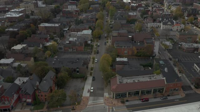 Aerial view of Buffalo NY, Camera pans up from streets to reveal the skyline of downtown and lake