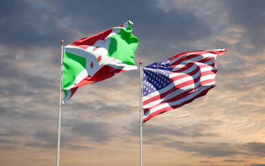 Beautiful national state flags of USA and Burundi together at the sky background. 3D artwork concept.