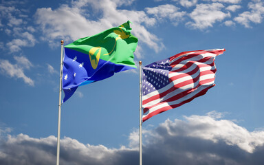 Beautiful national state flags of USA and Christmas Island together at the sky background. 3D artwork concept.
