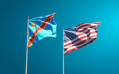 Beautiful national state flags of USA and Congo together at the sky background. 3D artwork concept.