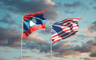 Beautiful national state flags of Laos and USA together at the sky background. 3D artwork concept.