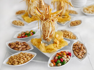 Beer with snacks on stone background. Top view