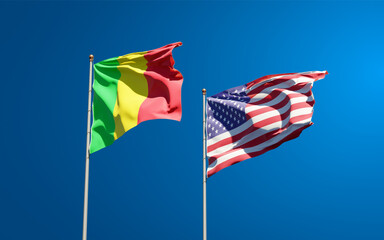 Beautiful national state flags of Mali and USA together at the sky background. 3D artwork concept.