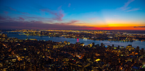 New York Manhattan skyline top view during autumn sunset with amazing colors and sights of...
