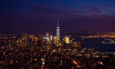 Fototapeta premium New York Manhattan skyline top view during autumn sunset with amazing colors and sights of skyscrapers
