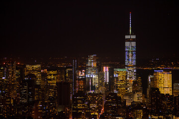 Fototapeta premium Amazing autumn sunset view from One World Trade Center sky scraper in New York to South Manhattan with great colors