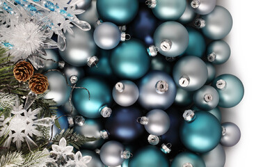 merry christmas background, top view of composition with blue balls, snowflakes and pine cones, isolated on white background useful as a greeting gift card template