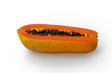 half of ripe papaya fruit with seeds isolated on white background.