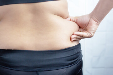 Obese woman needs weight control, she has excess fat.