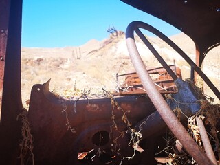 rusty truck wreck on the  old mining island of Serifos, Greece