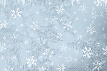 Ice flowers or frost work. Christmas graphic pattern. Light blue background. toped with al lot of different size and shapes of ice flowers