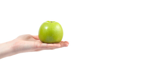 Ripe delicious juicy green apple in hand isolated on white background. Healthy eating and dieting concept